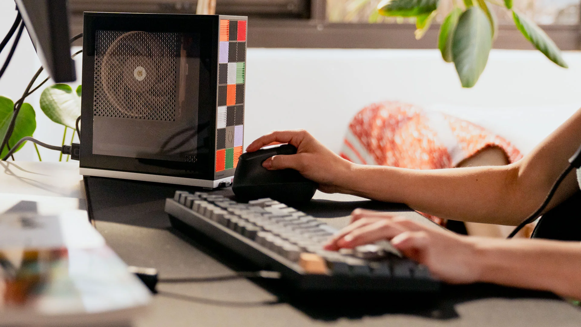 Framework Desktop on a desk.