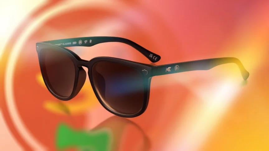 DuckDuckGo black sunglasses on a swirled orange background