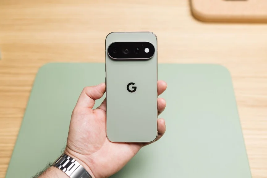 A hand holding a Google Pixel phone