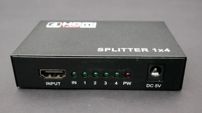 An HDMI splitter on a table.