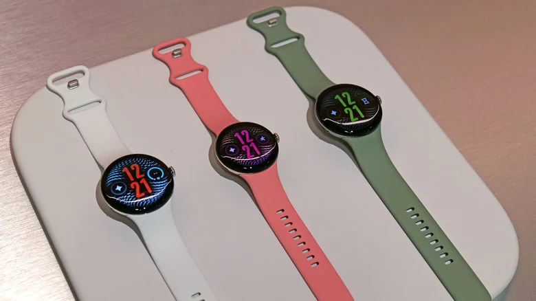 Pixel Watch 5 models with bands in different colors.
