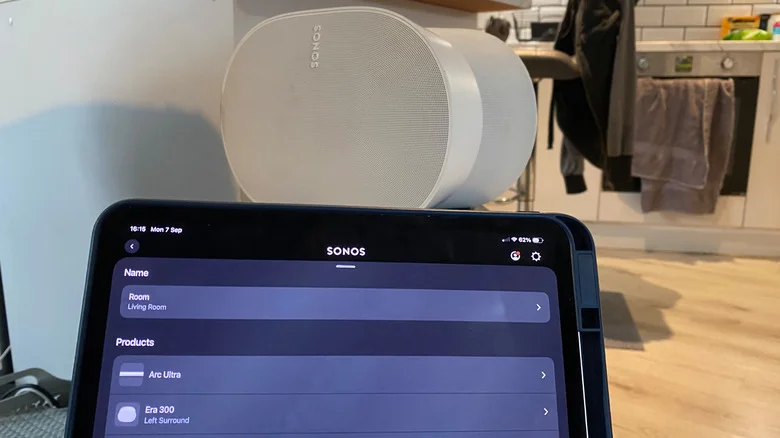 The Sonos app on an iPad in front of a Sonos Era 300 speaker.
