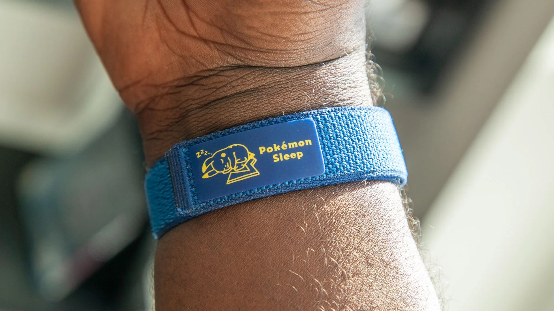 Wearing the Fitbit Air Pokémon Sleep edition