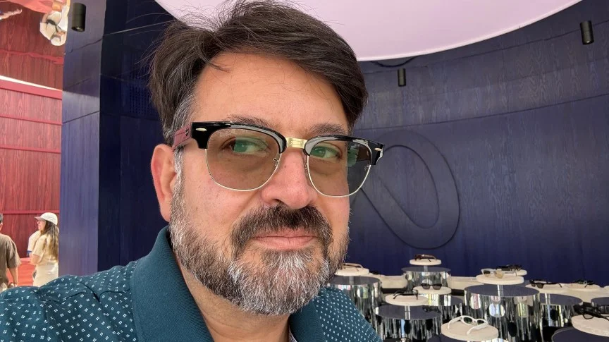 Scott Stein of CNET wearing Meta Ray-Ban Audio glasses
